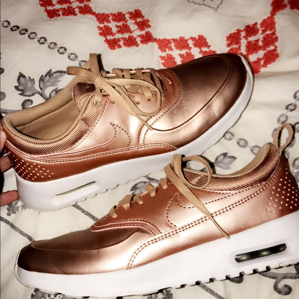 Rose gold Nike sneakers